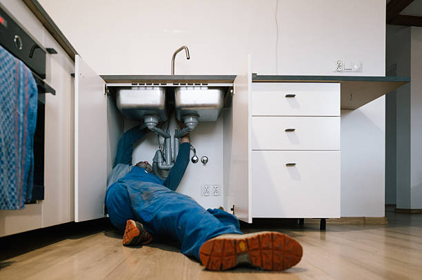 Professional Drain Cleaning technician working in Manchester, IA
